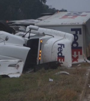 MukerjiLaw 1 DEAD IN CRASH INVOLVING FEDEX TRUCK NORTH OF CONROE 300x338