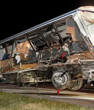 MukerjiLaw A SEMI COLLIDES WITH A TEXAS COLLEGE SOFTBALL TEAMS BUS KILLING FOUR AND INJURING 12 OTHERS 300x350
